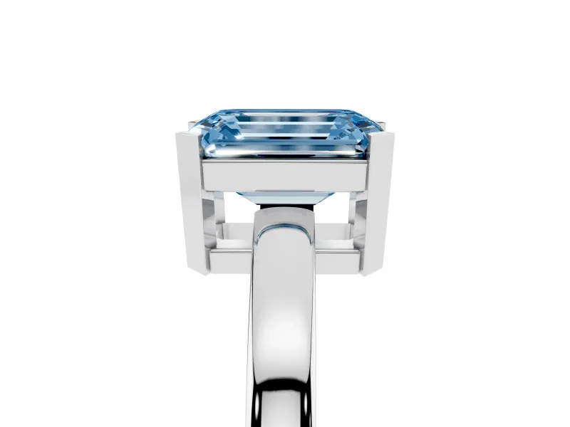 Fancy Blue Emerald Cut Diamond Solitaire Ring Set in Silver with Prong Head and Smooth Polished Band