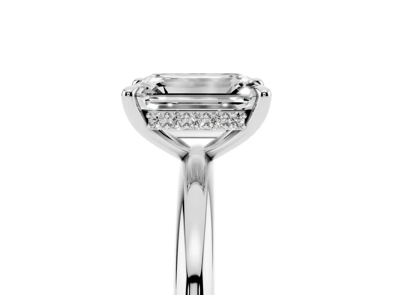Emerald Cut Diamond Solitaire Ring Set in Platinum with Thin Band and Prong Setting