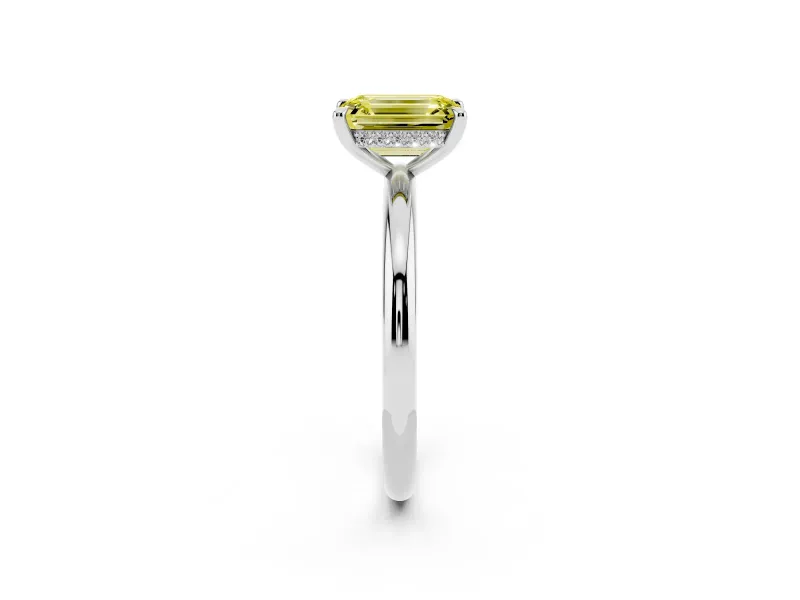 Fancy Yellow Emerald Cut Diamond Solitaire Ring Set in White gold with Thin Band and Prong Setting