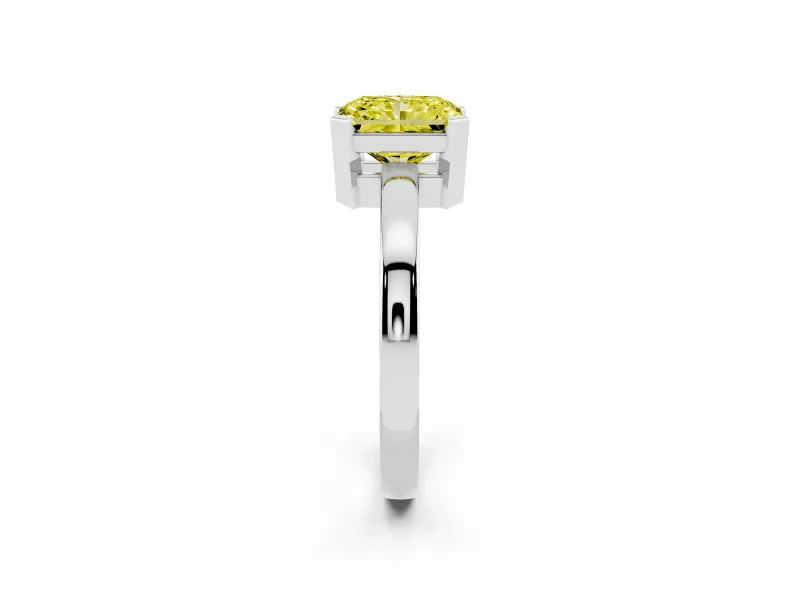 Fancy Yellow Radiant Cut Diamond Solitaire Ring Set in White gold with Prong Head and Smooth Polished Band