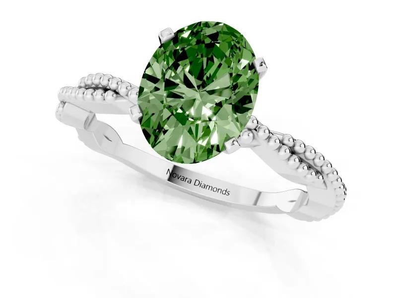 Fancy Green Oval Cut Diamond Solitaire Ring Set in White gold with Twisted Band and Bead Prong Setting