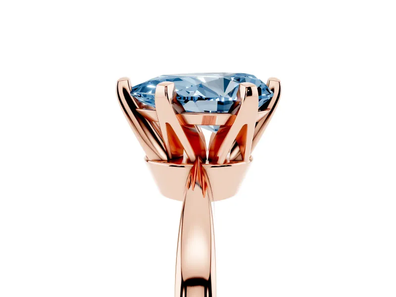 Fancy Blue Pear Cut Diamond Solitaire Engagement Ring Set in Rose gold with Slim Tapered Solitaire Band