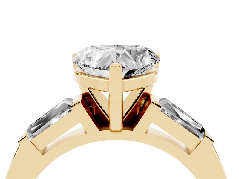 Heart Cut Diamond Solitaire Ring Set in Yellow gold with Tapered Baguette Side Stones and Prong Setting