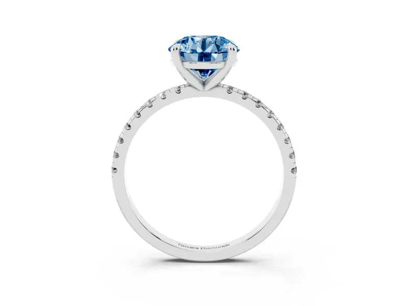 Fancy Blue Round Cut Diamond Brilliant Solitaire Ring Set in Platinum with Pavé Band and Prong Setting