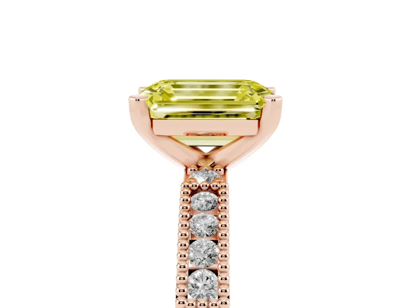 Fancy Yellow Emerald Cut Diamond Solitaire Ring Set in Rose gold with Slim Pavé Band and Prong Setting