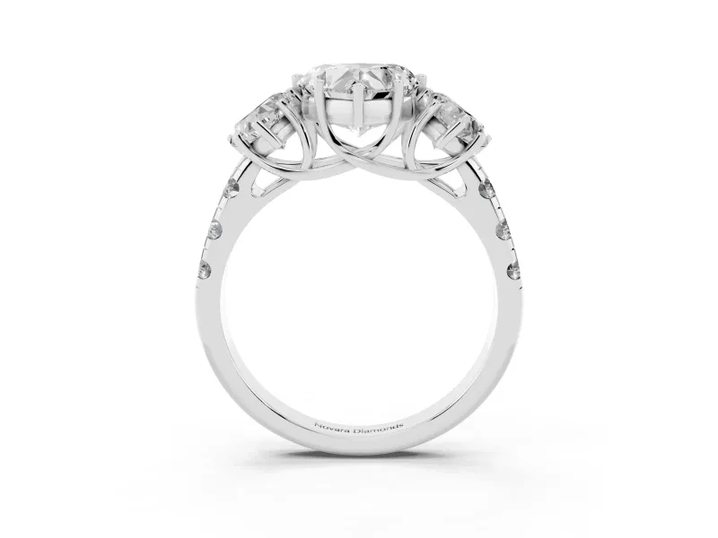 Heart Cut Diamond Three-Stone Ring Set in Silver with Pavé Band