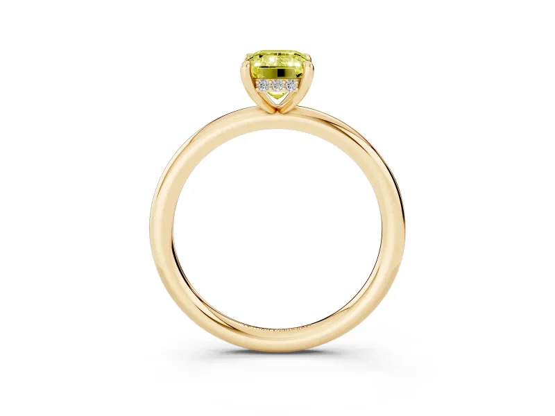 Fancy Yellow Emerald Cut Diamond Solitaire Ring Set in Yellow gold with Thin Band and Prong Setting