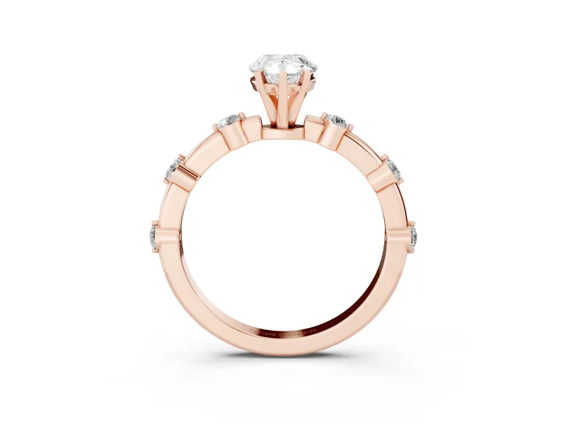 Pear Cut Diamond Solitaire Ring Set in Rose gold with Bezel Set Side Stones and Prong Setting