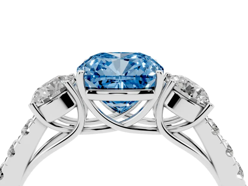 Fancy Blue Cushion Cut Diamond Three-Stone Ring Set in Silver with Round Side Stones and Delicate Pavé Band
