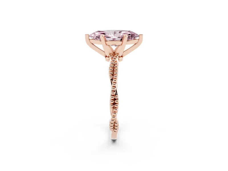 Fancy Pink Marquise Cut Diamond Solitaire Ring Set in Rose gold with Twisted Band and Bead Prong Setting