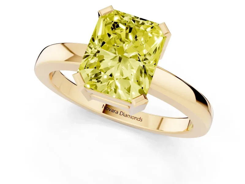 Fancy Yellow Radiant Cut Diamond Solitaire Ring Set in Yellow gold with Prong Head and Smooth Polished Band