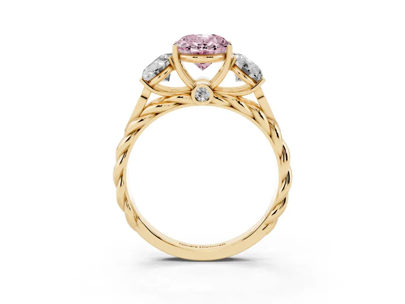 Fancy Pink Oval Cut Diamond Three-Stone Ring Set in Yellow gold with Braided Band