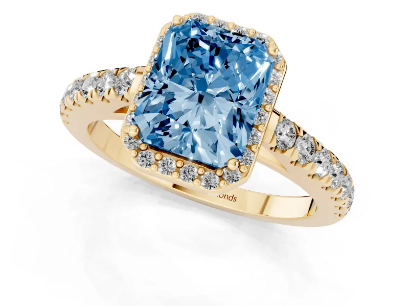 Fancy Blue Radiant Cut Diamond Halo Engagement Ring Set in Yellow gold with Pavé Band and Prong Setting
