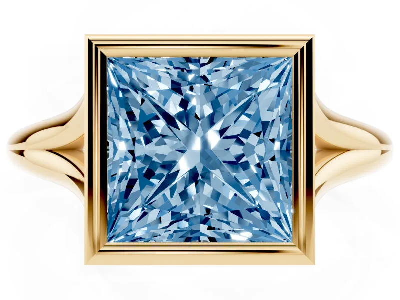Fancy Blue Bezel Set Princess Cut Diamond Solitaire Ring Set in Yellow gold with Tapered Band