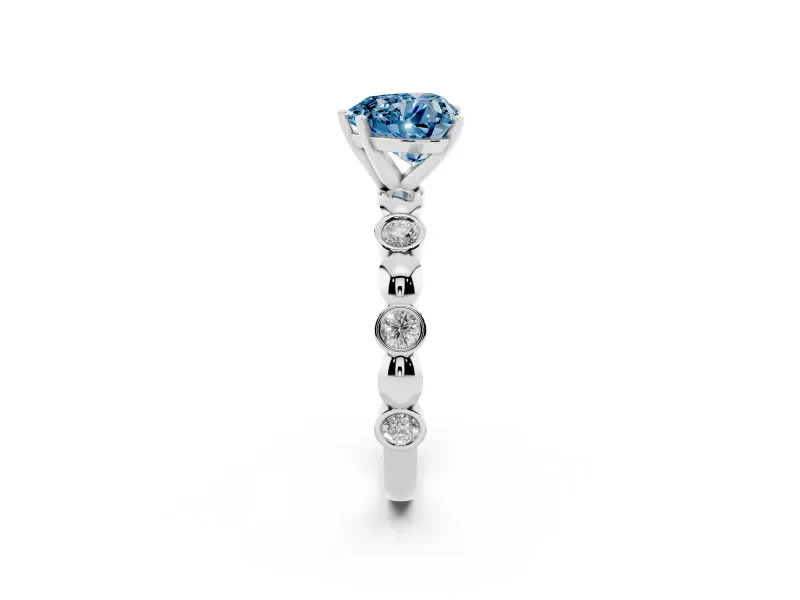 Fancy Blue Heart Cut Diamond Solitaire Ring Set in Silver with Bezel-Set Accents on Beaded Band and Prong Setting
