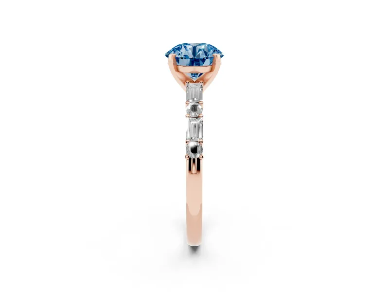 Fancy Blue Round Cut Diamond Solitaire Set in Rose gold with Side Baguettes and Channel Set Band