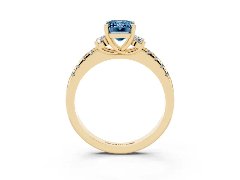 Emerald Cut Side Stone Engagement Ring Setting for a Fancy Blue Lab-Grown Diamond | Pave Band | Yellow Gold