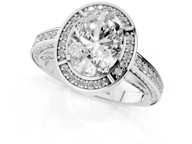 Oval Cut Diamond Halo Pavé Split Shank Ring Set in White gold with Prong Setting
