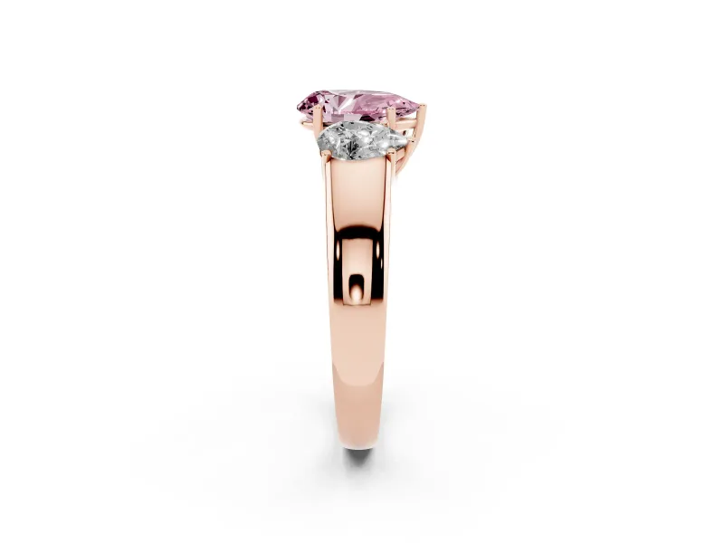 Fancy Pink Three-Stone Pear Cut Diamond Ring Set in Rose gold with Matching Prong Settings and Plain Band