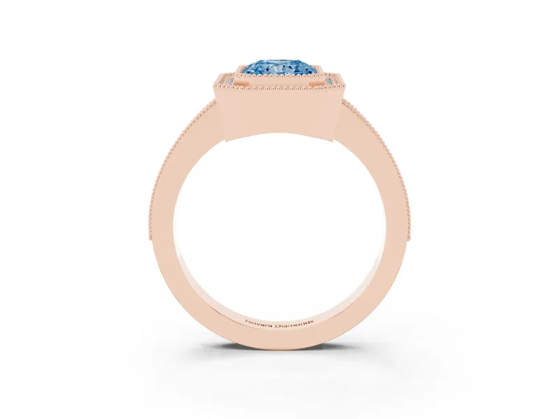 Fancy Blue Radiant Cut Diamond Halo Engagement Ring Set in Rose gold with Pavé Band and Round Halo Stones