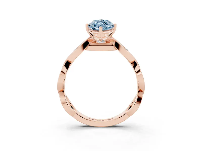 Fancy Blue Marquise Cut Diamond Twist Band Solitaire Ring Set in Rose gold with Leaf Prong Setting and Accent Stones