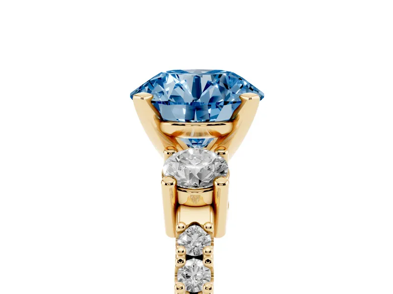 Fancy Blue Three-Stone Round Cut Diamond Pavé Band Ring Set in Yellow gold with Prong Setting