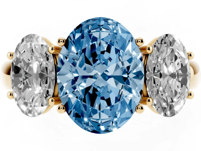 Fancy Blue Oval Cut Diamond Three-Stone Ring Set in Yellow gold with Bold Center and Classic Band
