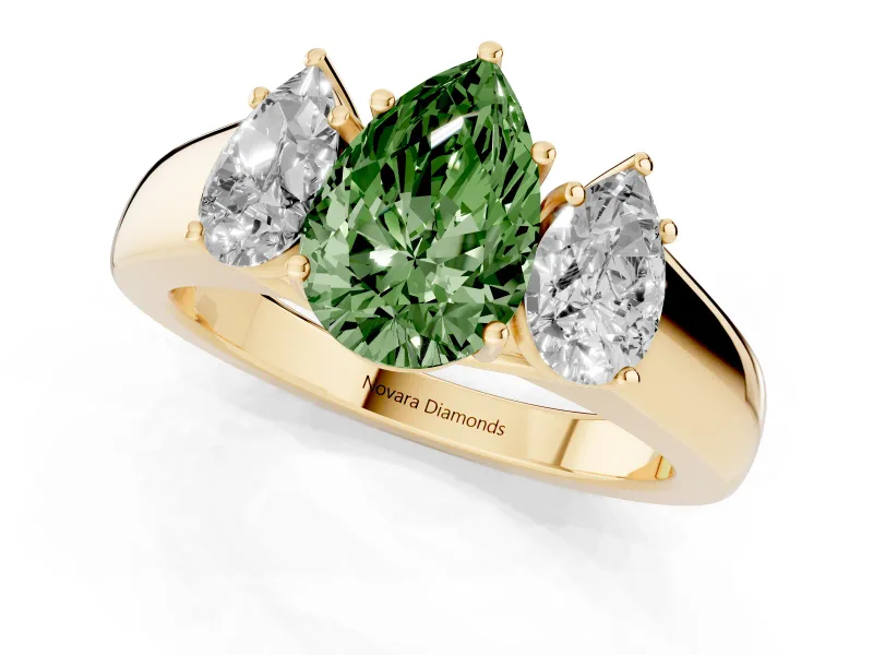 Fancy Green Three-Stone Pear Cut Diamond Ring Set in Yellow gold with Matching Prong Settings and Plain Band