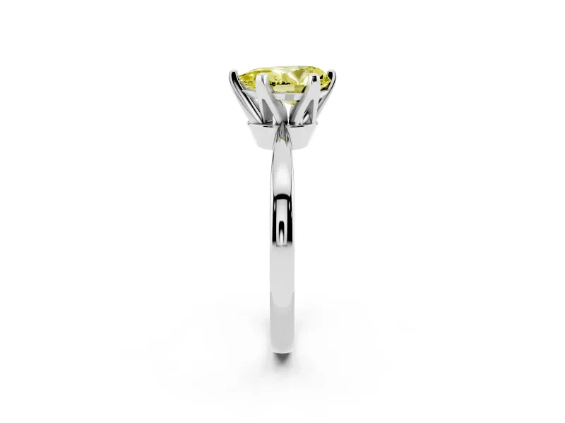 Fancy Yellow Pear Cut Diamond Solitaire Engagement Ring Set in White gold with Slim Tapered Solitaire Band