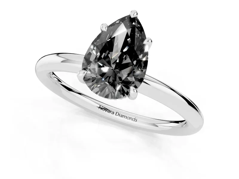 Fancy Black Pear Cut Diamond Solitaire Ring Set in White gold with Thin Band and Prong Setting