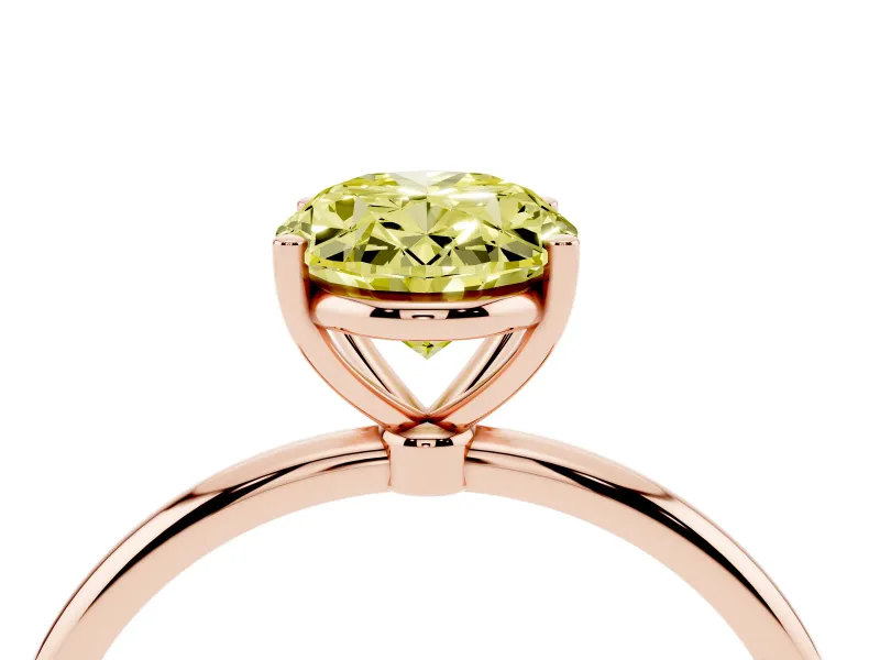 Fancy Yellow Oval Cut Diamond Solitaire Engagement Ring Set in Rose gold with Thin Band and Prong Setting