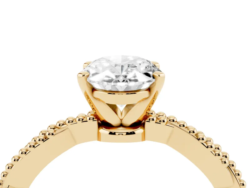 Oval Cut Diamond Solitaire Ring Set in Yellow gold with Twisted Band and Bead Prong Setting