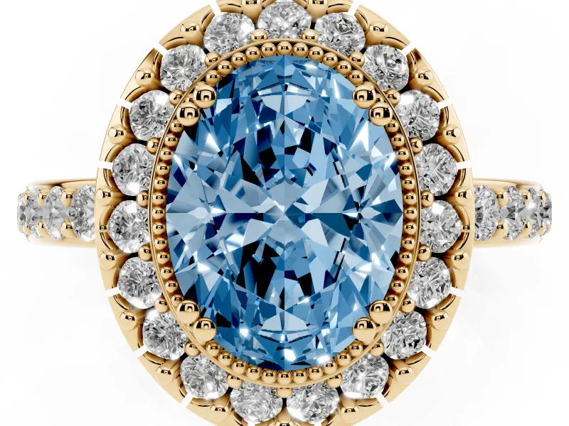 Fancy Blue Oval Cut Diamond Halo Ring Set in Yellow gold with Pavé Shank and Prong Setting