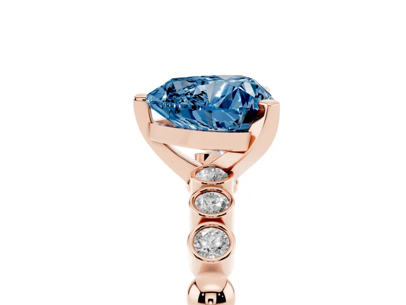 Fancy Blue Heart Cut Diamond Solitaire Engagement Ring Set in Rose gold with Bezel Accents on Beaded Band