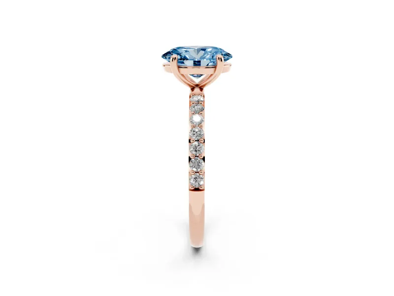 Fancy Blue Oval Cut Diamond Solitaire Ring Set in Rose gold with Round Pavé Band and Prong Setting