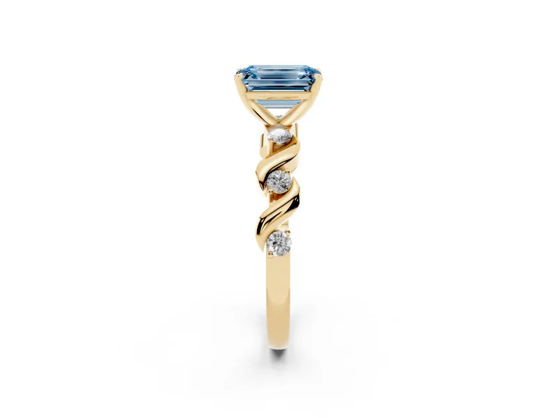 Emerald Cut Ribbon Twist Engagement Ring Setting for a Fancy Blue Lab-Grown Diamond | Accented Shoulders | Yellow Gold