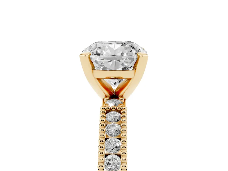Cushion Cut Diamond Solitaire Ring Set in Yellow gold with Slim Pavé Band and Prong Setting
