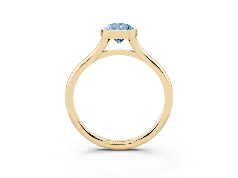 Fancy Blue Bezel Set Pear Cut Diamond Solitaire Ring Set in Yellow gold with Tapered Band