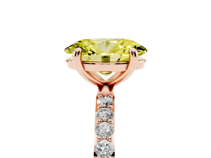 Fancy Yellow Oval Cut Diamond Solitaire Ring Set in Rose gold with Round Pavé Band and Prong Setting