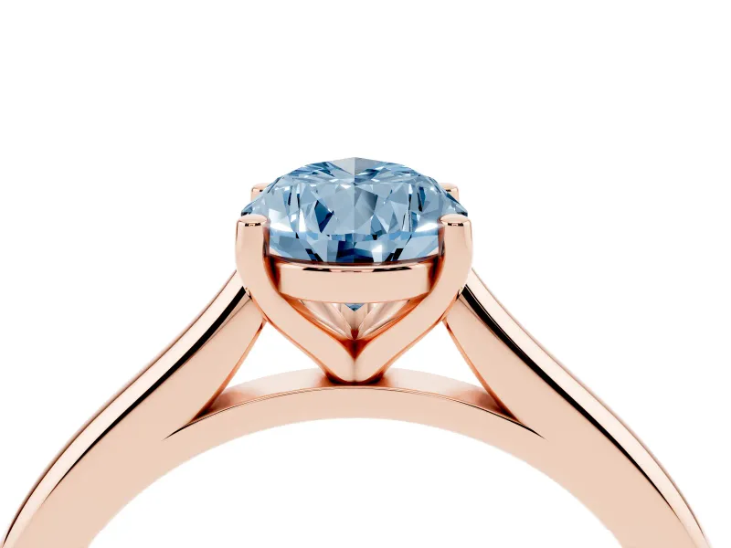 Fancy Blue Pear Cut Diamond Solitaire Ring Set in Rose gold with Cathedral Band and Prong Setting