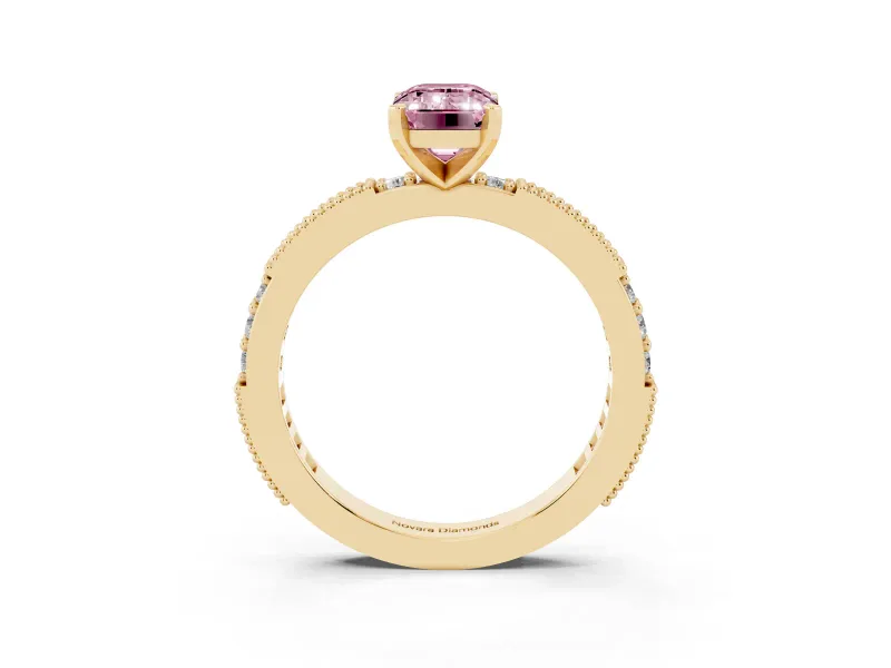 Fancy Pink Emerald Cut Diamond Solitaire Ring Set in Yellow gold with Slim Pavé Band and Prong Setting
