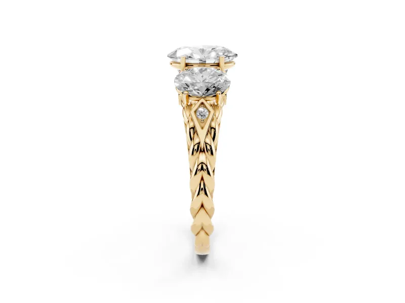 Oval Cut Diamond Three-Stone Ring Set in Yellow gold with Braided Band