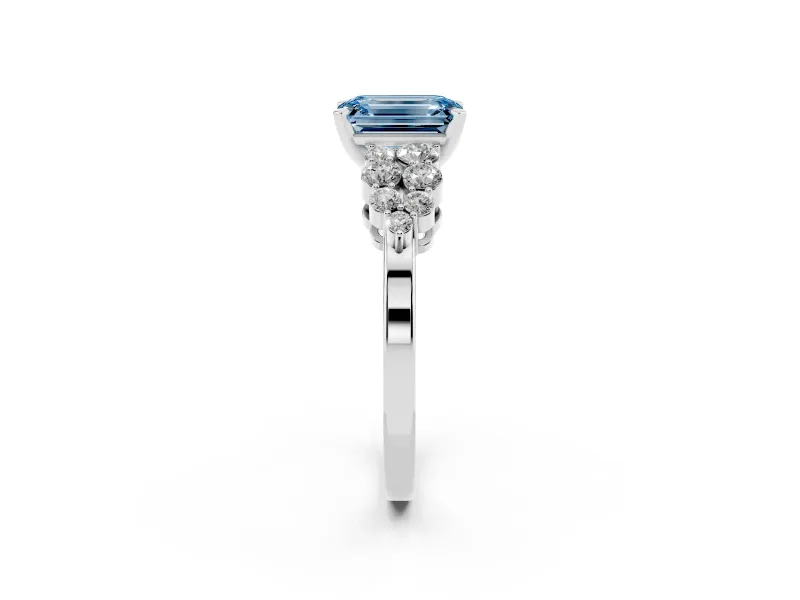 Fancy Blue Emerald Cut Diamond Cluster Engagement Ring Set in Platinum with Pavé Band and Prong Setting