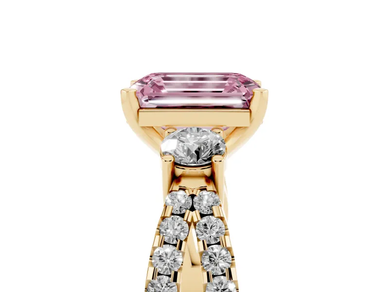 Fancy Pink Emerald Cut Diamond Three-Stone Ring Set in Yellow gold with Pavé Split Shank and Prong Setting