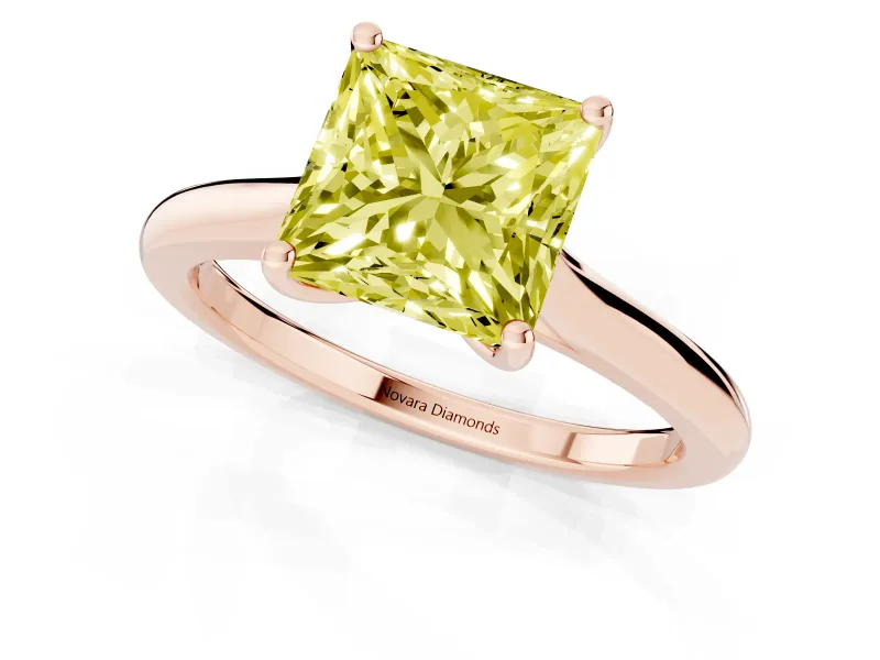 Fancy Yellow Princess Cut Diamond Solitaire Ring Set in Rose gold with Cathedral Band and Prong Setting