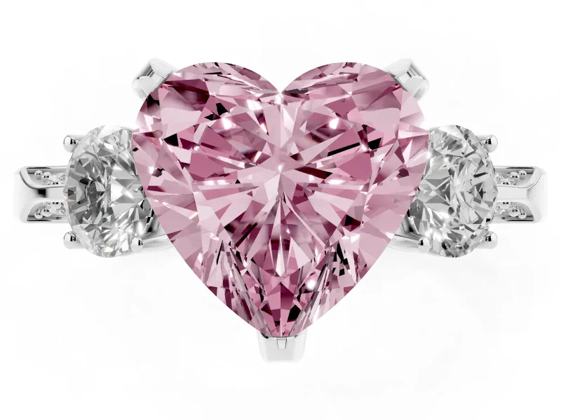 Fancy Pink Heart Cut Diamond Three-Stone Ring Set in Platinum with Pavé Band and Smaller Side Stones