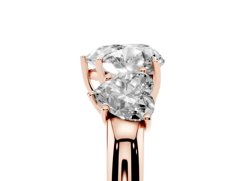 Heart Cut Diamond Three-Stone Ring Set in Rose gold with Bold Center and Classic Band