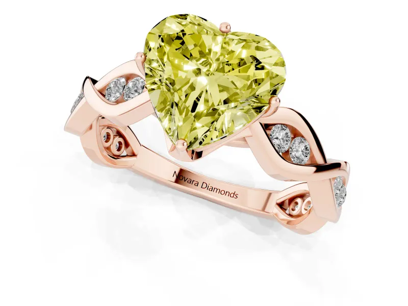 Fancy Yellow Heart Cut Diamond Twist Band Solitaire Ring Set in Rose gold with Leaf Prong Setting and Accent Stones