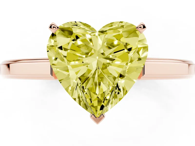 Fancy Yellow Heart Cut Diamond Solitaire Ring Set in Rose gold with Prong Setting and Classic Band