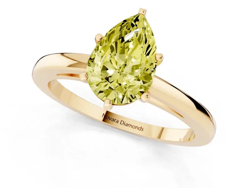 Fancy Yellow Pear Cut Diamond Solitaire Engagement Ring Set in Yellow gold with Prong Setting on a Classic Band